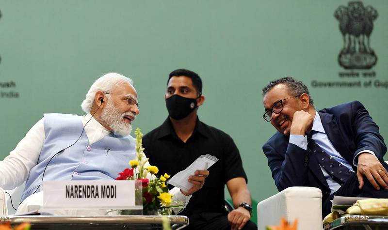 India's Prime Minister Narendra Modi, left, with World Health Organisation Director General Tedros Adhanom Ghebreyesus. AFP  