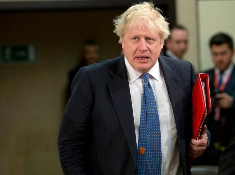 British Foreign Secretary Boris Johnson arrives for a meeting of the NATO-Georgia Council at NATO headquarters in Brussels on Wednesday, Dec. 6, 2017. (AP Photo/Virginia Mayo)