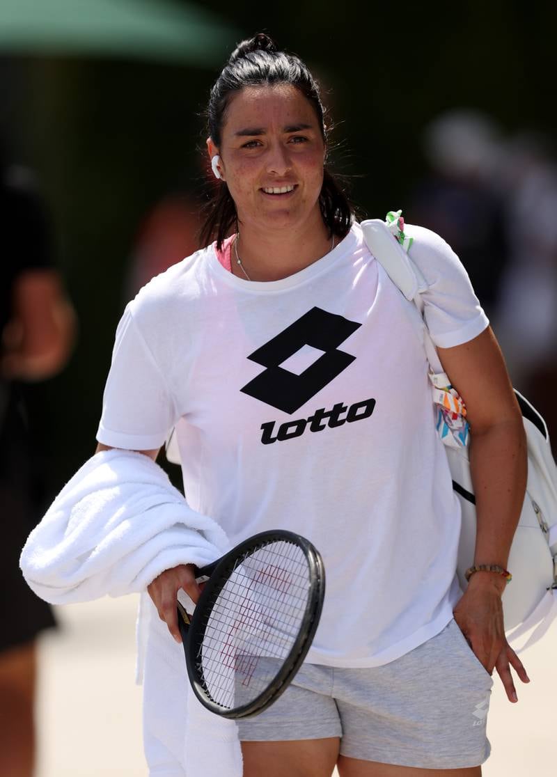 Ons Jabeur of Tunisia makes her way to a practice session at All England Lawn Tennis and Croquet Club. Getty Images