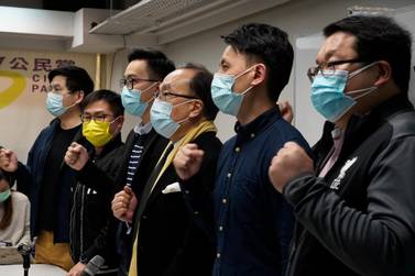 Pro-democratic party members shout slogans in response to the mass arrests during a press conference in Hong Kong Wednesday, January 6, 2021. AP 