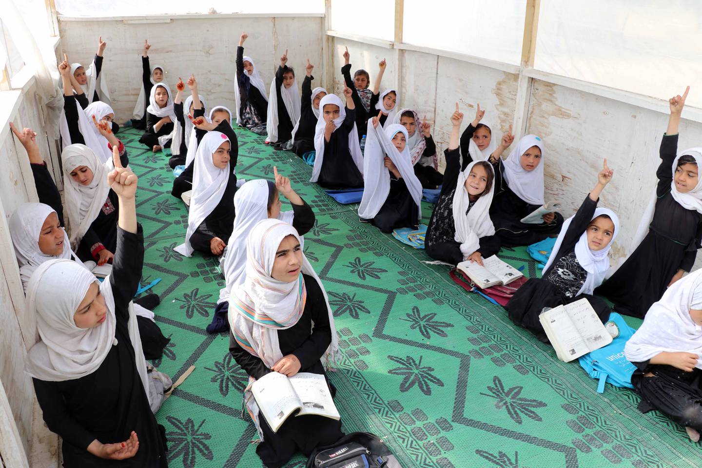 Afghan girls attend school in Kandahar, Afghanistan. EPA