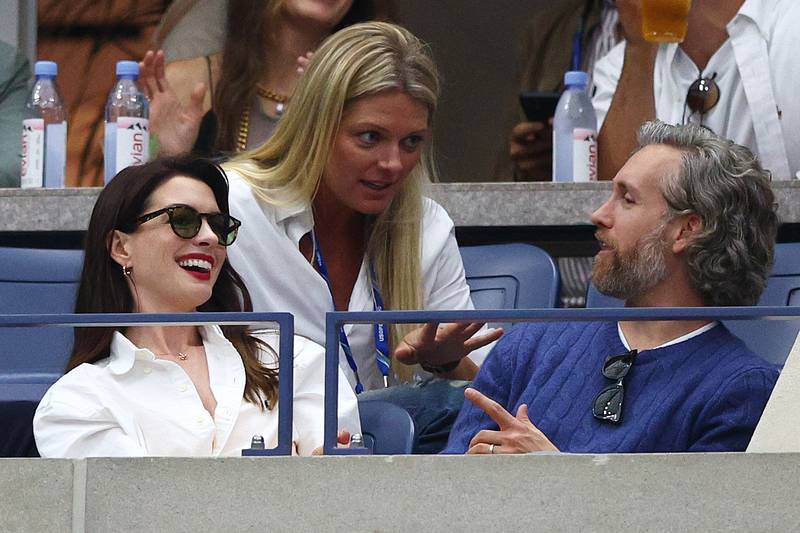 Hollywood star Anne Hathaway and her husband Adam Shulman watch the US Open final between Casper Ruud and Carlos Alcaraz. AFP