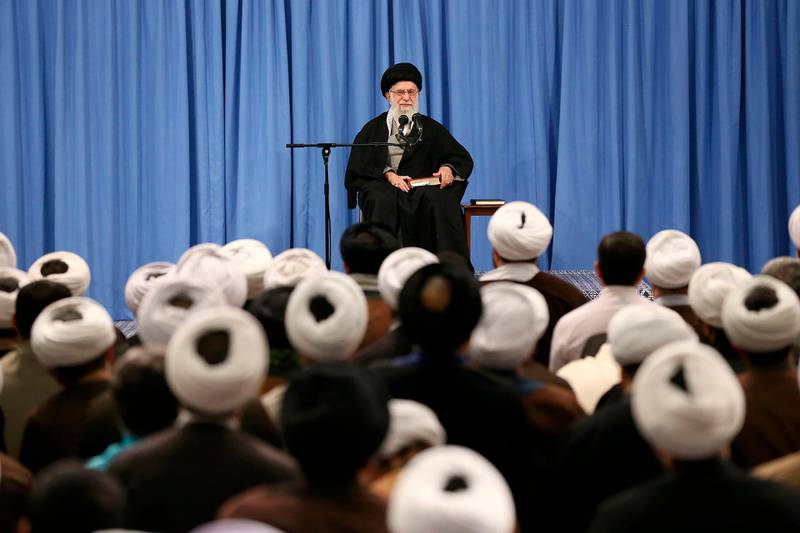 In this photo released by an official website of the office of the Iranian supreme leader, Supreme Leader Ayatollah Ali Khamenei speaks in a meeting in Tehran, Iran, Sunday, Feb. 23, 2020. Officials in Iran haven't announced the full results from parliamentary elections two days ago, but on Sunday the country's supreme leader accused enemy "propaganda" of trying to disuade people from voting by amplifying the threat of the coronavirus. (Office of the Iranian Supreme Leader via AP)