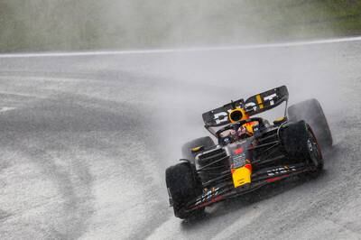Max Verstappen of Red Bull Racing steers his car in the rain. EPA 