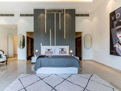 The master bedroom has ensuite facilities and a large dressing room. Courtesy Luxhabitat Sotheby's International Realty