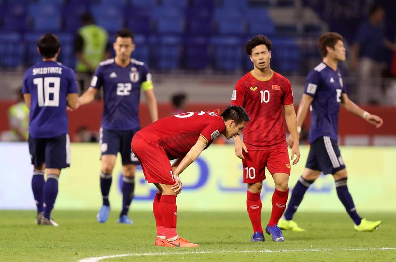 Dubai, United Arab Emirates - January 24, 2019: Đỗ Hùng Dũng and Nguyen Công Phuong (R) of Vietnam looks disappointed after loosing the quarterfinal game between Japan and Vietnam in the Asian Cup 2019. Thursday, January 24th, 2019 at Al Maktoum Stadium, Dubai. Chris Whiteoak/The National