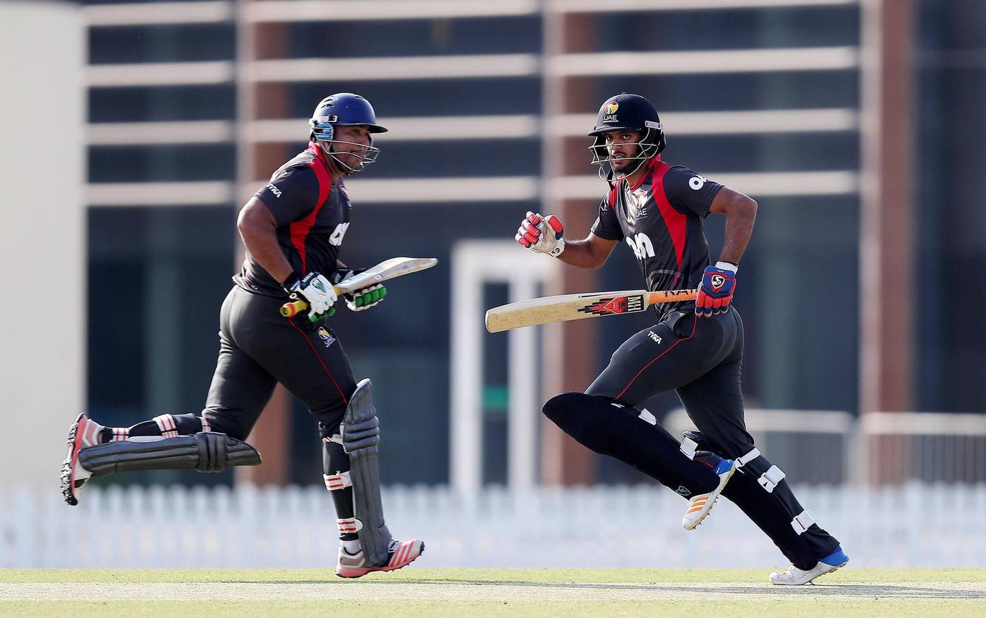 DUBAI , UNITED ARAB EMIRATES , NOV 16   – 2017 :-  Left to Right - Ashfaq Ahmed and Chirag Suri of UAE team running between the wickets during the one day international cricket match against Zimbabwe A team at the ICC Academy in Dubai Sports City in Dubai. (Pawan Singh / The National) Story by Paul Radley