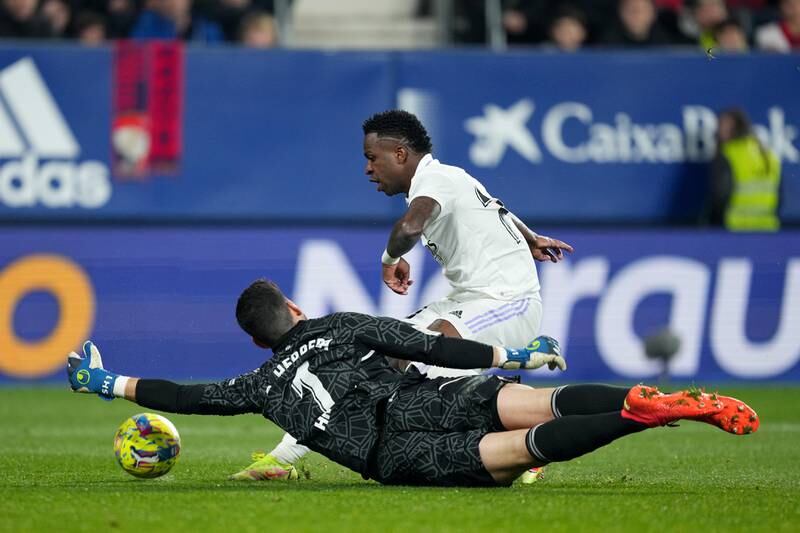 Vinicius Junior of Real Madrid has a shot saved by Sergio Herrera of Osasuna. Getty Images
