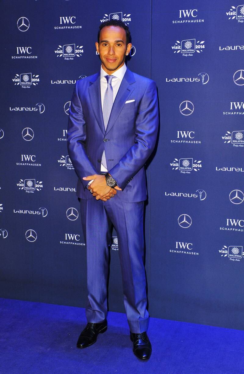 Lewis Hamilton, in a blue suit, attends the Laureus World Sports Awards at the Istana Budaya Theatre on March 26, 2014, in Kuala Lumpur. Getty Images