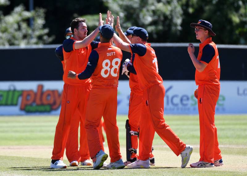 Netherlands' Paul van Meekeren celebrates with teammates after taking the wicket of England opener Phil Salt for 49. Reuters