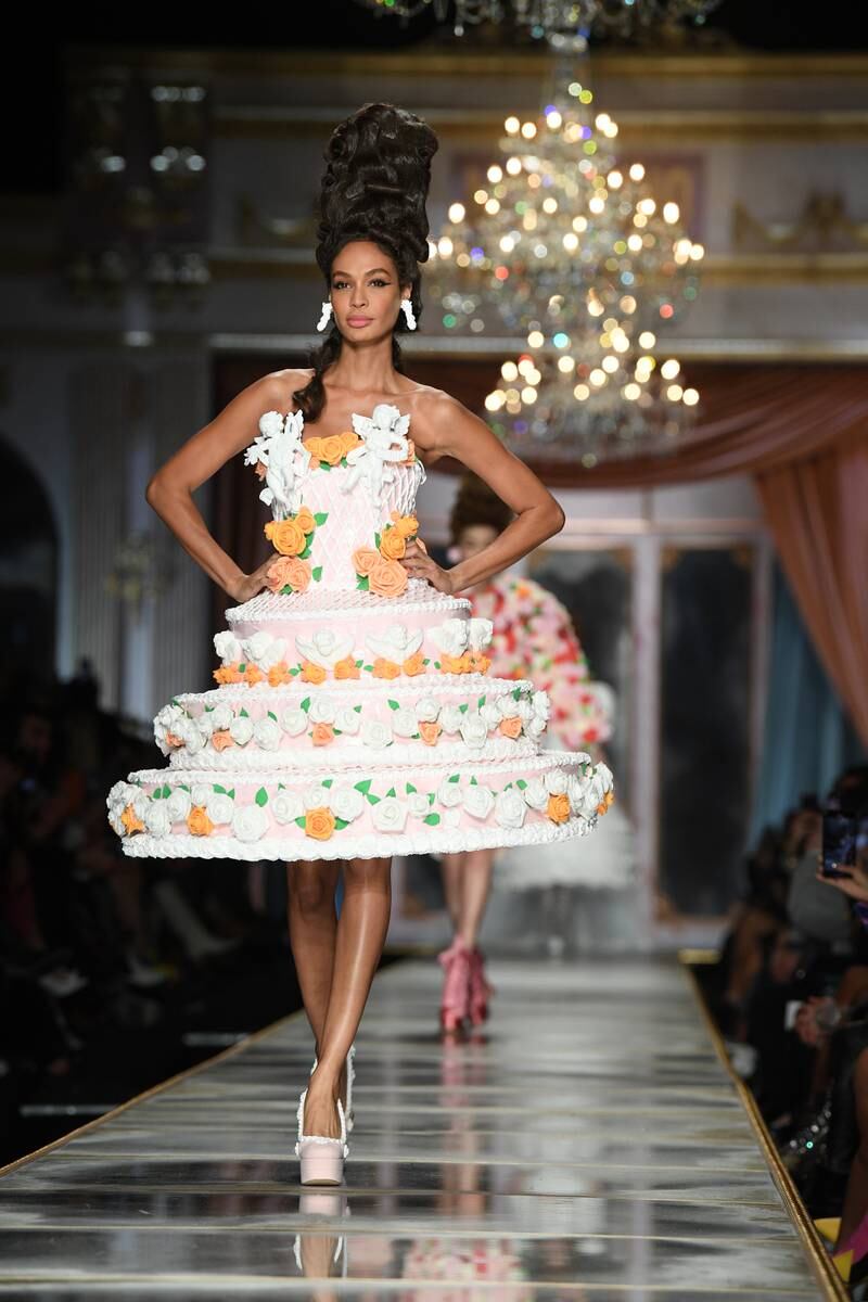 Joan Smalls walks the runway in a cake from Moschino's autumn/winter 2020 collection. Getty Images