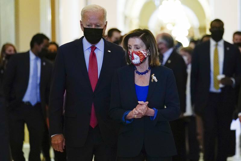 US President Joe Biden and House Speaker Nancy Pelosi. AP