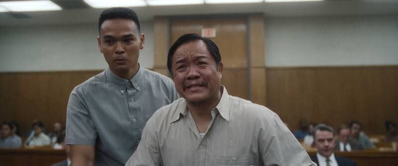 Scott Paophavihanh as Anouke Sinthasomphone, left, and Khetphet Phagnasay as Sounthone Sinthasomphone, the family members of one of Dahmer's victims. 