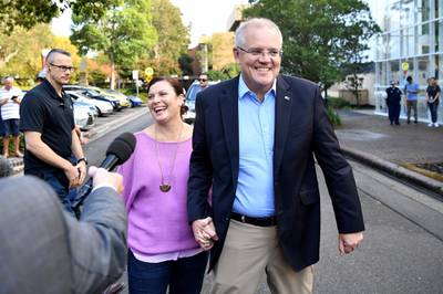 epa07583269 Prime Minister Scott Morrison and wife Jenny speak to the media as they arrive at the Horizon Church in Sydney, Australia, 19 May, 2019. Morrison's Liberal party government, with 59.2 per cent of the vote counted, has one the Australian federal election.  EPA/JOEL CARRETT  AUSTRALIA AND NEW ZEALAND OUT