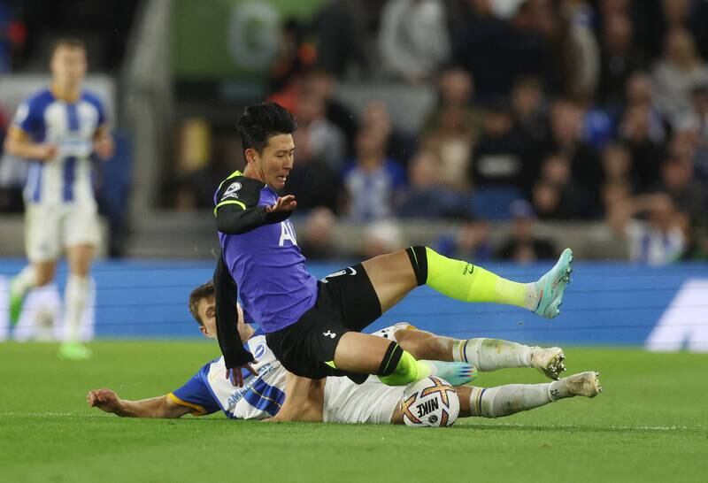 Tottenham Hotspur's Son Heung-min in action with Brighton & Hove Albion's Lewis Dunk. Action Images