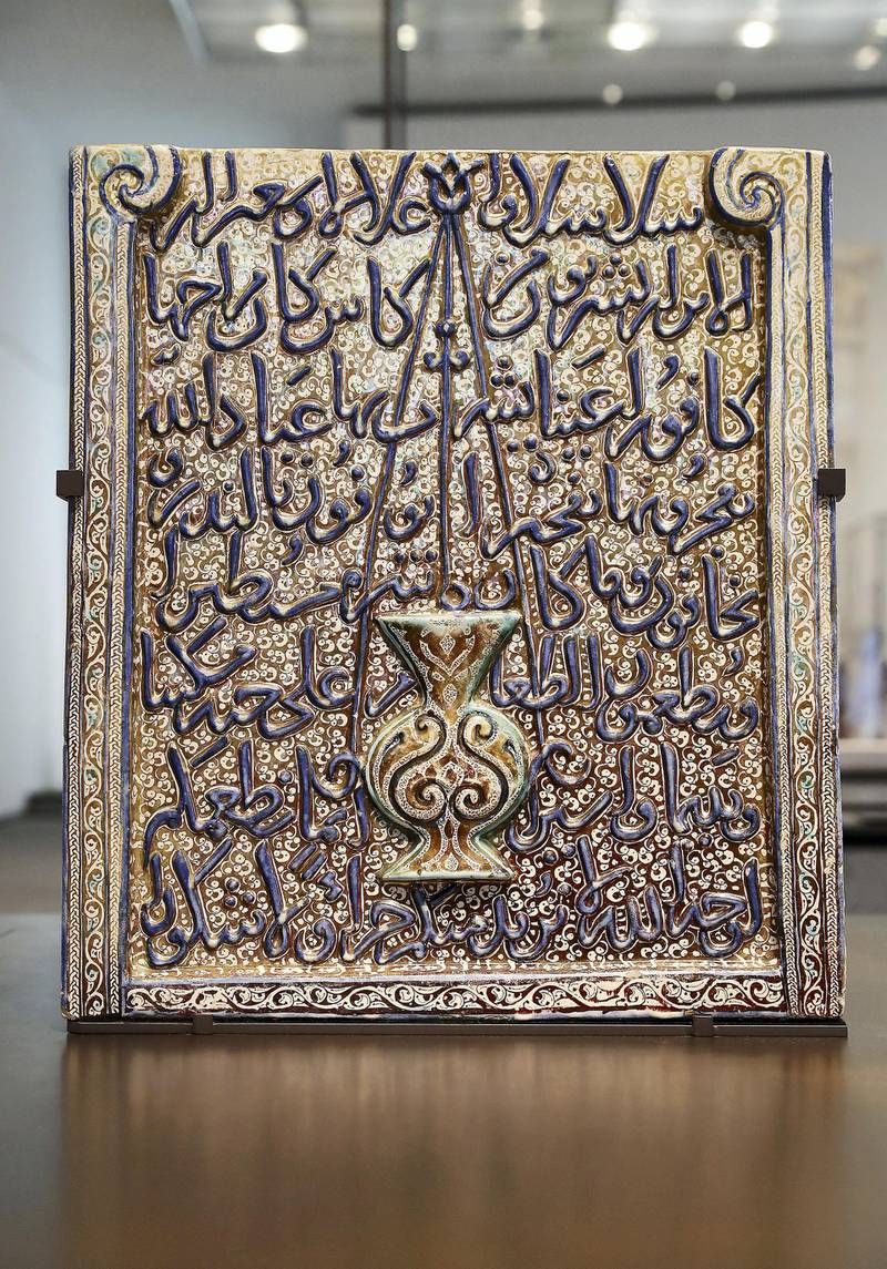 ABU DHABI , UNITED ARAB EMIRATES, September 16 – 2018 :- Fragment of a plaque in the form of a mihrab , Ilkhanid Dynasty , Iran , 1250-1350  on display at the Louvre museum in Abu Dhabi. ( Pawan Singh / The National )  For Arts and Culture. Story by Rupert Hawksley 