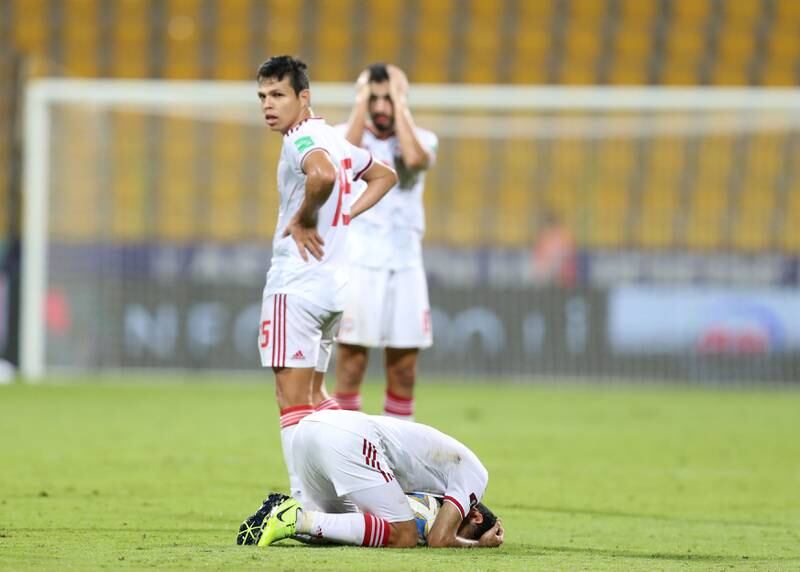 UAE players are devastated after the 2-2 draw against Iraq in their World Cup qualifier at the Zabeel Stadium in Dubai on Tuesday, October 12, 2021. Chris Whiteoak / The National