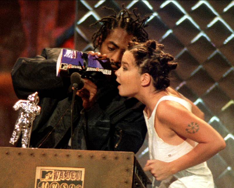 Bjork and Coolio present an MTV Video Music Award in 1994. Reuters