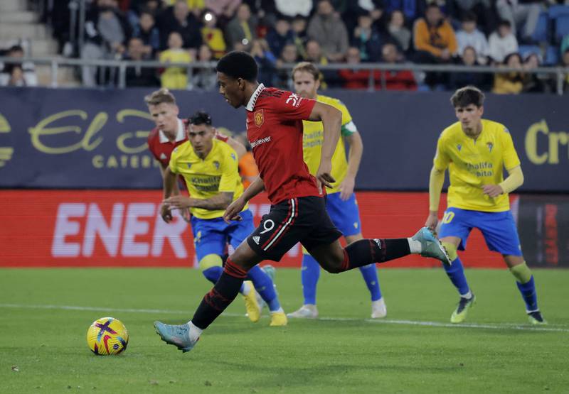 Manchester United's Anthony Martial scores his team's first goal from the penalty spot. Reuters