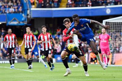 Back in team after one-match ban, had chance to attack Chelsea goal late in first half but poor first touch sent ball racing out for goal kick. Helped keep Madueke very quiet. AFP