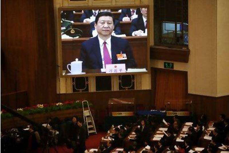 China's vice president, Xi Jinping, is seen on a screen last month during the 11th National People's Congress at the Great Hall of China in Beijing.