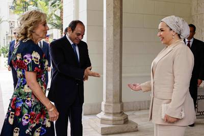Egyptian President Abdel Fattah El Sisi and his wife,  Ms Amer, welcome the US first lady to Cairo. AFP