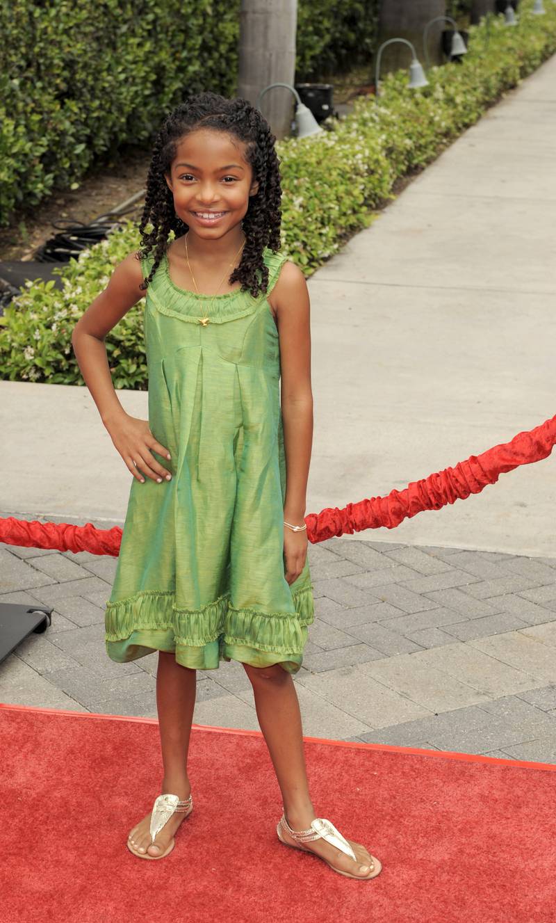 A young Yara Shahidi, in a green dress, arrives for the premiere of 'Imagine That' in Los Angeles, California, on June 6, 2009. EPA