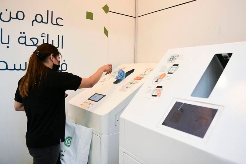 Leni Marasigan, 30, has used the Cycle machine several times to recycle the plastic bottles at World Trade Centre Mall, Abu Dhabi. All photos: Khushnum Bhandari / The National
