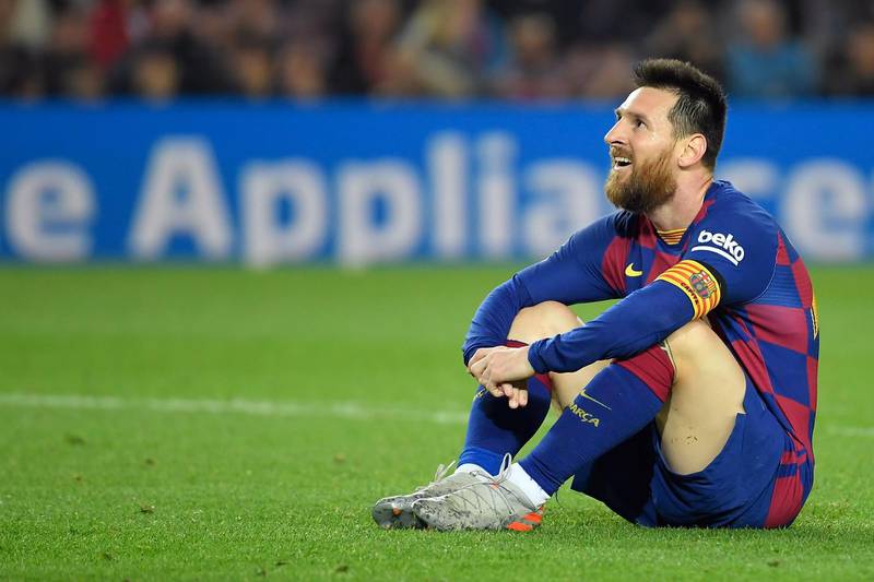 Barcelona's Argentine forward Lionel Messi sits on the field during the Spanish league football match between FC Barcelona and Real Valladolid FC at the Camp Nou stadium in Barcelona on October 29, 2019. / AFP / LLUIS GENE