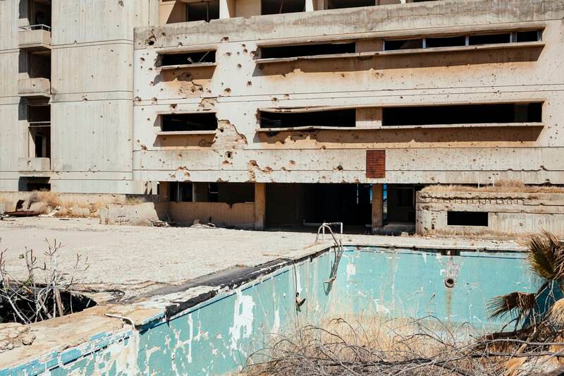 An abandoned hotel with its empty swimming pool. The once bustling and colourful place became a ghost town after Turkish troops sealed off the area to its 17,000 former Greek-speaking residents in 1974