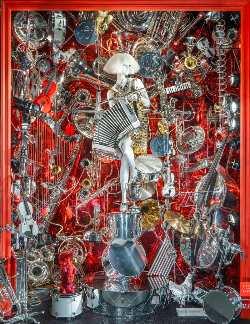 Each of the seven windows at Bergdorf Goodman celebrates a craft including woodcraft, dress-making, paper sculpture, mosaic, papier mache, metal craft and scrapbooking, and tells a story. Photo: Ricky Zehavi