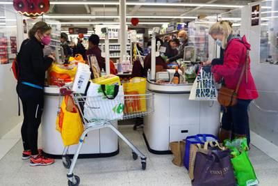 People shop at a Sainsbury's store, amid the coronavirus disease (COVID-19) outbreak, in London, Britain December 22, 2020. REUTERS/Hannah McKay