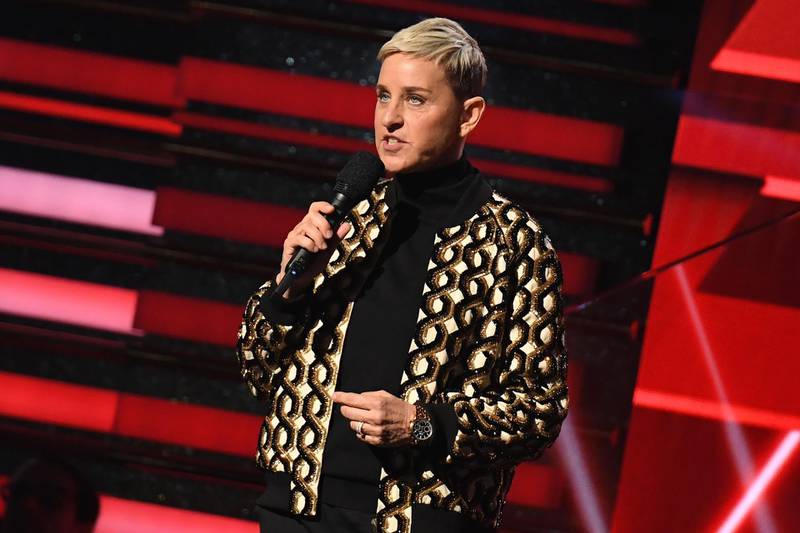 (FILES) In this file photo taken on January 26, 2020 US comedian Ellen DeGeneres introduces Lil Nas X and Billy Ray Cyrus during the 62nd Annual Grammy Awardsin Los Angeles.  Ellen DeGeneres opened the 18th season of her talk show September 21, 2020 by addressing allegations of toxic workplace culture under her watch, saying "I take responsibility for what happens at my show." / AFP / Robyn Beck

