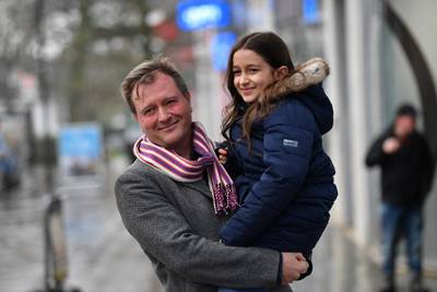 Richard Ratcliffe with daughter Gabriella outside their house in London on Wednesday. AFP