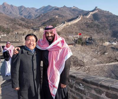 Saudi Crown Prince Mohammad Bin Salman poses for a photo with the Chinese Ambassador to Saudi Arabia at the Great Wall of China. EPA