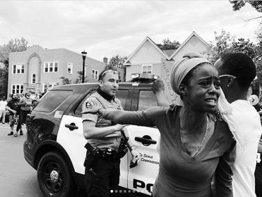A woman at a protest in Minneapolis. Patience Zalanga / Via @patiencezalanga
