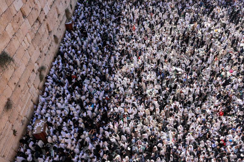Jewish men gather at the Western Wall in the old city of Jerusalem during the holiday of Sukkot. AFP