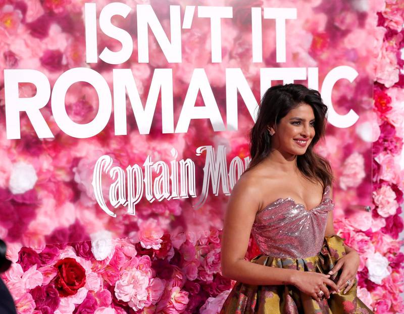 Priyanka Chopra chose a metallic strapless gown by Vivienne Westwood Couture. Reuters