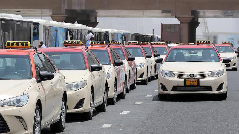 Owners of Dubai taxi number plates will share in a Dh14 million windfall. Pawan Singh / The National