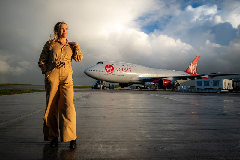 Head of Spaceport Cornwall, Melissa Thorpe, next to Cosmic Girl - a specially-adapted 747 - in Newquay. PA