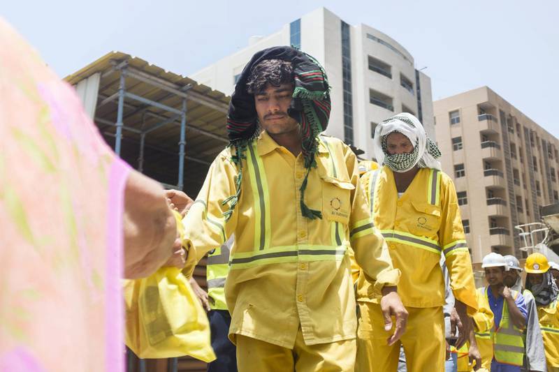 DUBAI, UNITED ARAB EMIRATES - MAY 28, 2018. The Ramadan Sharing Fridges initiative in Dubai, distributes meals to construction workers in Bur Dubai.(Photo by Reem Mohammed/The National)Reporter: Nawal Al RamahiSection: NA