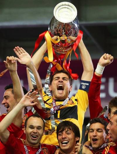 Spain goalkeeper Iker Casillas lifts the trophy after winning the 2012 European Championship final against Italy in Kiev. EPA
