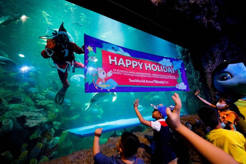 Diver Fachri Hariansyah, 26, at the Sea World Ancol aquarium in Jakarta, Indonesia. Reuters