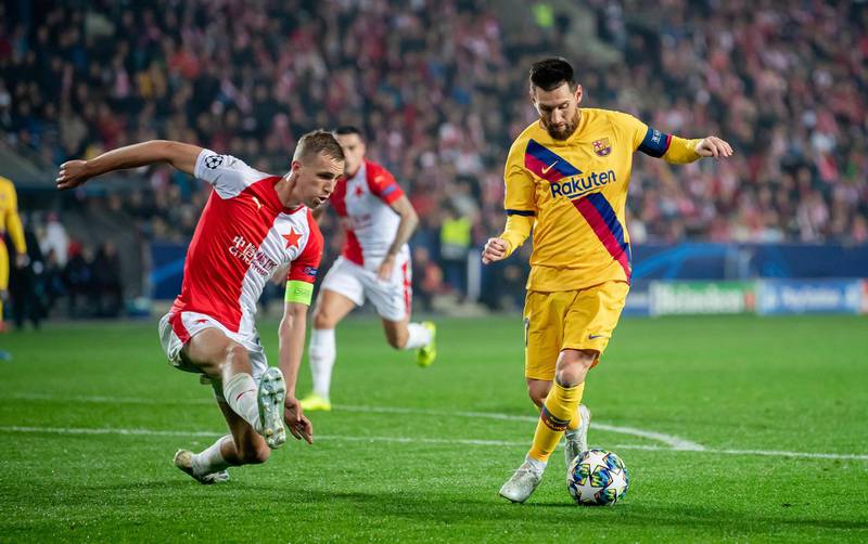 Tomas Soucek, left, attempts to stop Lionel Messi. Getty