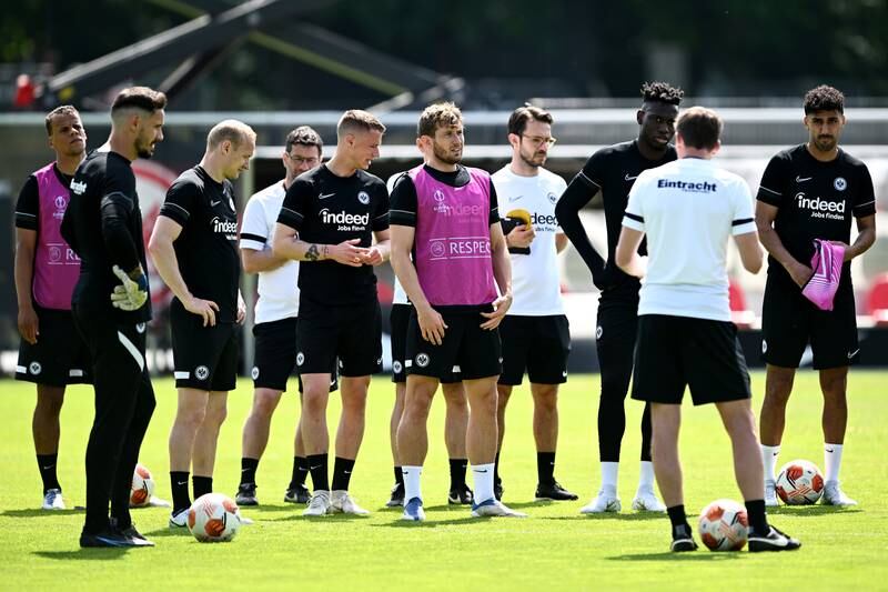 Eintracht Frankfurt players listen to coach Oliver Glasner. Getty