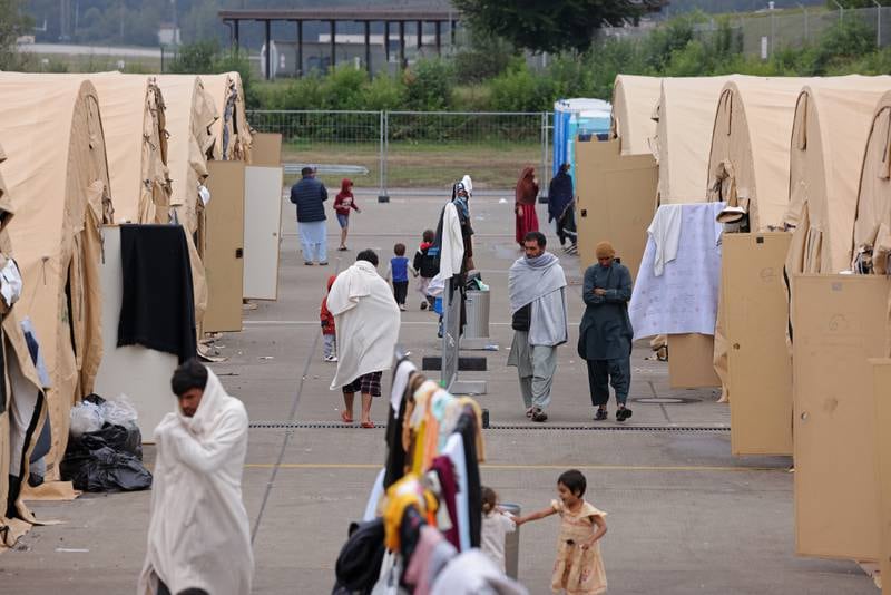 Military tents provide accommodation for Afghans at Ramstein Air Base, Germany. Getty