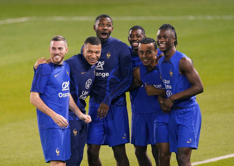 France's Jordan Vertout, Kylian Mbappe, Marcus Thuram, Ousmane Dembele, Jules Kounde and Eduardo Kamavinga train for the World Cup final in Doha. PA