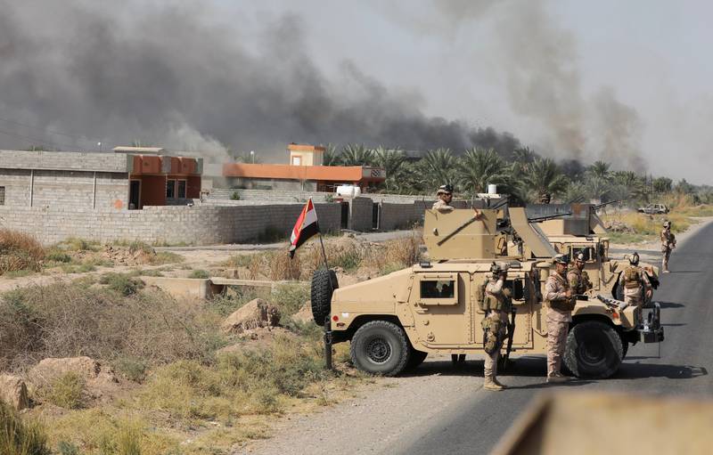 Iraqi security forces are deployed after an attack by ISIS extremists, near Muqdadiya, in Iraq. Reuters