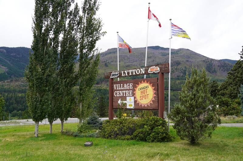 A welcome to Lytton sign on the Trans Canada highway lets visitors no, the village is "Canada's hot spot." Willy Lowry / The National