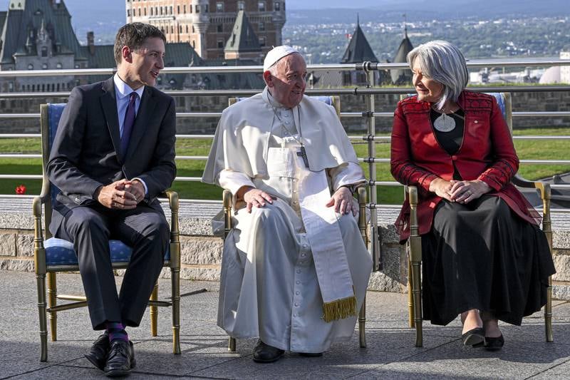 Mr Justin Trudeau and Ms Simon meet Pope Francis. EPA
